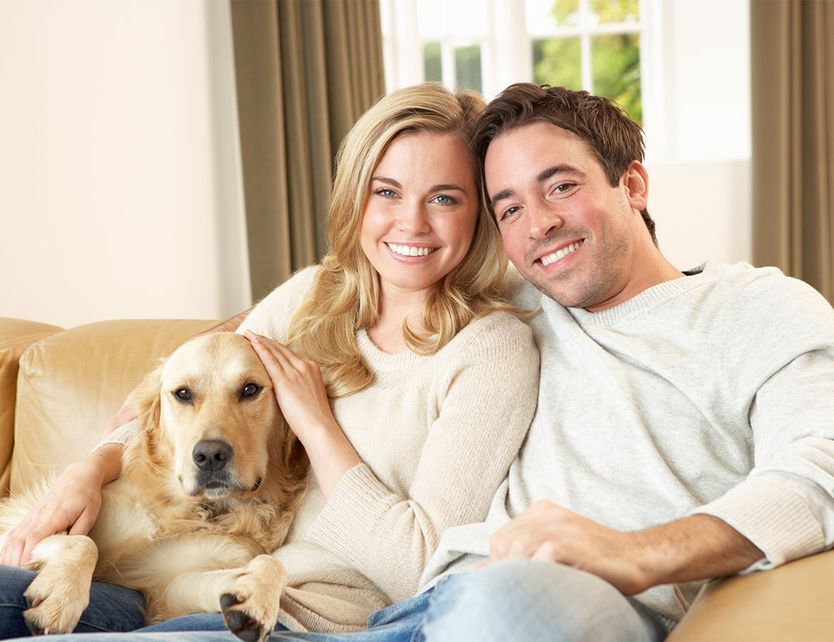 young-happy-couple-with-dog